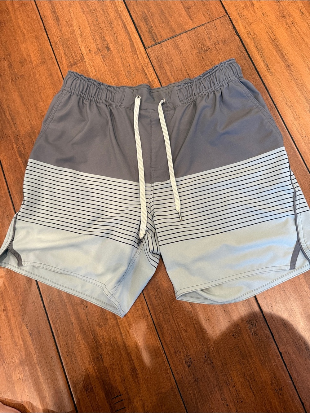 Vuori Two-Tone Gray Athletic Shorts with Stripe Detail